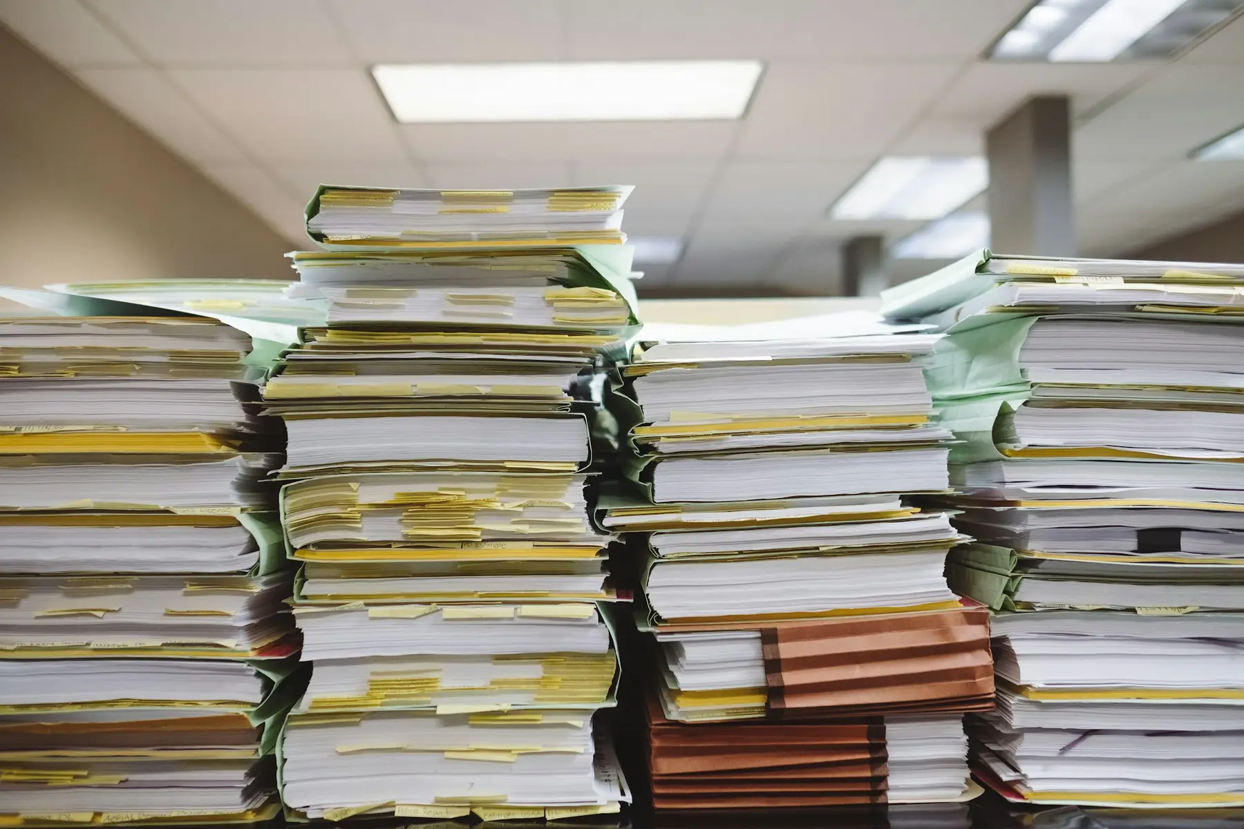 Stacks of paper documents and folders (stock photo)