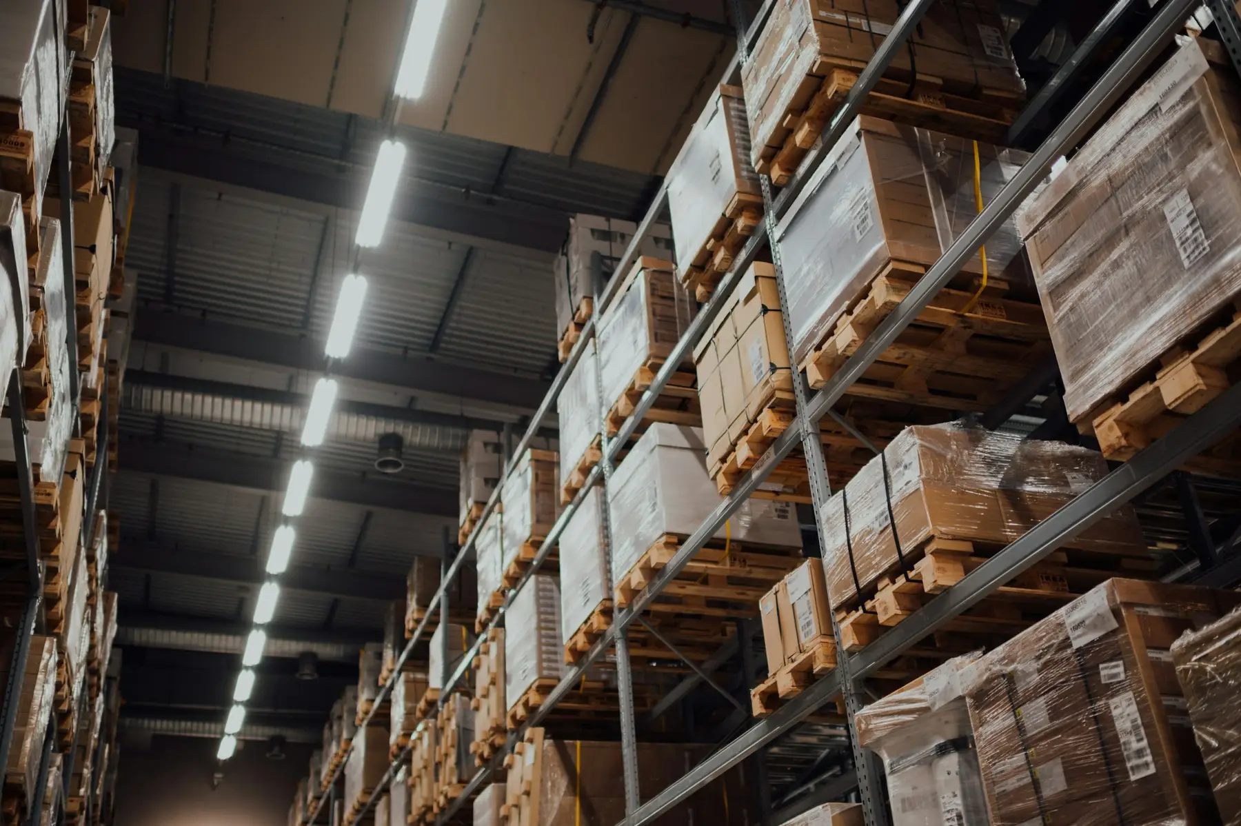 Warehouse racking with stacked boxes (stock photo)